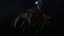 Tal Shiar Adapted Battle Cruiser with Earth Space Dock in background